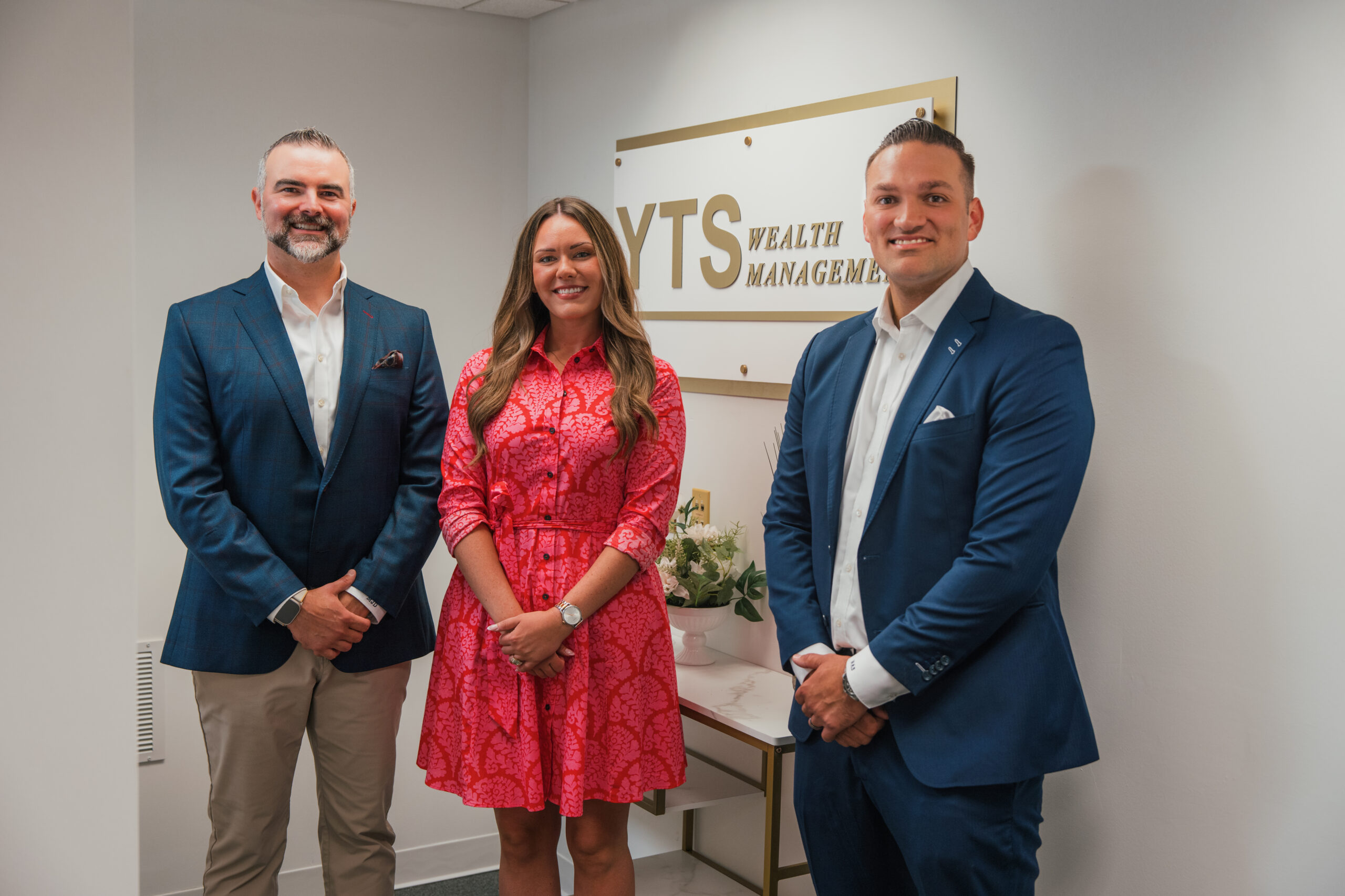 YTS Wealth Management team in front of the building during the Aspinwall Branch Ribbon Cutting